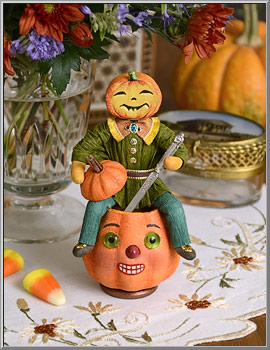Mr Pumpkin Carves a Jack-O-Lantern cotton ornament